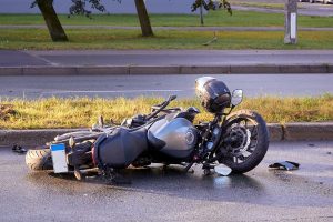 Wrecked-motorcycle-lying-on-the-road.jpg